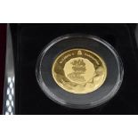 A Gold Twenty Pound Coin. The 2018 Sapphire Coronation Gold Twenty Pound Coin. Mintage 99 coins.