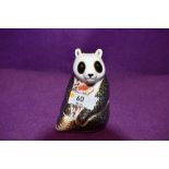A Royal Crown Derby paperweight. Panda modelled by Robert Jefferson and decoration design by Rita