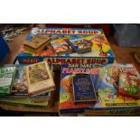 A collection of vintage board games and card games.