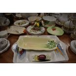 A selection of vintage salad themed plates, bowls and platters, bearing names such as Carlton