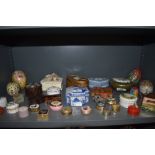 A mixed collection of vintage trinket boxes, pill boxes and tins. Various styles and shapes