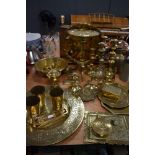 A large lot of vintage brass, including platters and chargers, boxes, jugs, bowls a door knocker and