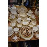 A collection of part tea services, including Floral Cauldon having gilt edging and selection of