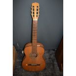 A vintage 'Tereda' Spanish style acoustic guitar.