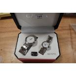 A cased pair of quartz fashion watches by Geneva