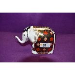 A Royal Crown Derby paperweight. Small Elephant modelled by Tabbenor and decoration design by Jo
