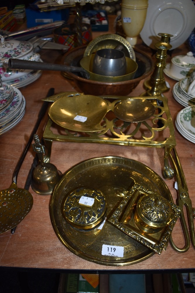 A selection of vintage brass ware, including trivet, ink well, pans and more, also a copper basin is