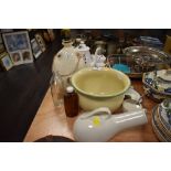 A selection of vintage medical supplies including enamel bowl and kidney dish