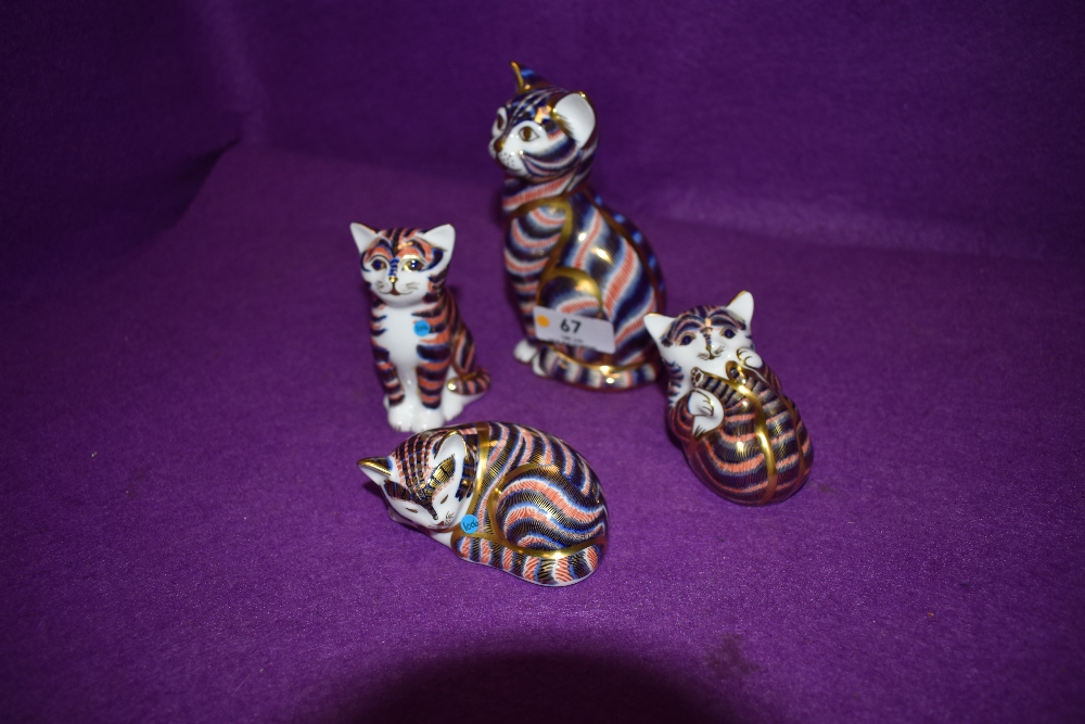 Four Royal Crown Derby Paperweights. Cat modelled by Robert Jefferson and decoration design by Brian
