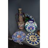 Three vintage display plates having floral patterns, a large vase marked ,R V Laroche Belge to the