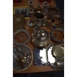 A mixed collection of decorative plated ware and similar including candlestick holders and cruet