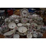 An extensive quantity of Crown Staffordshire 'thousand flowers' dinner service, having floral