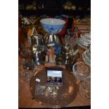 A mixed lot containing glass ware, stainless steel, cufflinks and a copper charger, wooden figurines