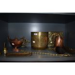 A selection of vintage copper and brass items, including planter, plaques and lidded jugs and