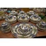 A Royal Doulton 'Merryweather' part dinner service comprising of tureens, large platters, plates,