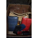 A collection of handbags and purses, a mix of vintage and retro with some more modern ones, some