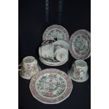 A small lot of cups, saucers and side plates, having Dark red transfer print with hand painted