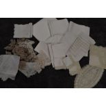 A beautiful lot of vintage and antique table linen, including damask table cloths,napkins,mats and