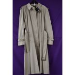 Vintage Aquascutum belted rain coat, as new, with tags, leaflet and spare button, medium size.