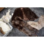 A collection of vintage furs, including fox fur capelet, trims and stole, and an unusual white coney