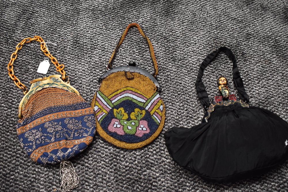 Three antique evening bags, two of which have extensive bead work and are in brilliant condition and