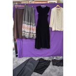 A mixed lot of vintage including three 1960s maxi skirts and a velvet dress,a 1980s velvet Marks and