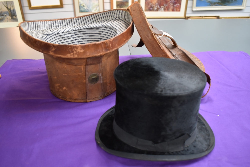 An antique boxed top hat,J kendall,Dudley street,Birmingham and high street Saltley. Silk lining has