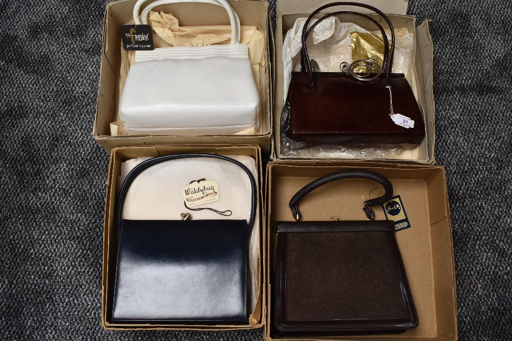 Four vintage handbags in their boxes, includes Freedex and Waldybag,very good condition although