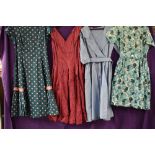 Four vintage 1950s cotton dresses, and a jacket also an unfinished garment in blue velvet. All are