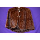 Vintage chestnut brown 1930s Capelet, thought to be ermine,having scalloped hem and decorative brass