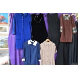 Nine vintage dresses, mixed style and sizes, mainly 60s and 70s with one perhaps being early 80s.