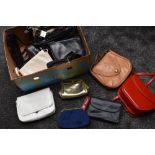 A box of good quality modern and retro handbags , some with tags still attached, including Tula