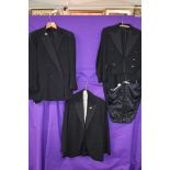 A selection of gents evening attire including dinner jackets and trousers, tailcoats and