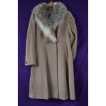 Vintage 1960s camel coloured wool coat having fox fur collar, button front and button detailing to
