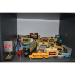 A shelf of mixed diecast buses and similar diecasts including Lledo, Matchbox etc, most boxed