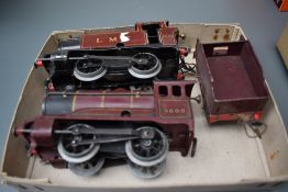 Two Hornby clockwork 0 gauge 0-4-0 LMS Tank Engines, one with tender