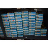 A shelf of Athearn HO scale rolling stock, Tankers, Hoppers, Cabooses etc, 62 items, all boxed and