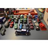 Twenty six pre and post war playworn Dinky diecast vehicles including Studebaker, Lincoln Zephyr,