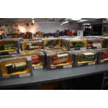 A collection of Sixty One Corgi Classics diecast Advertising Vehicles including Huntley & Palmer,