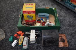 A selection of mixed toys including a early 20th century Junior tinplate Tpewriter, a Chad Valley