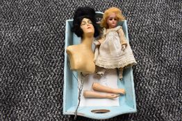 An early 20th century Petite Francaise J Verlingue (anchor) bisque headed doll having fixed eyes and