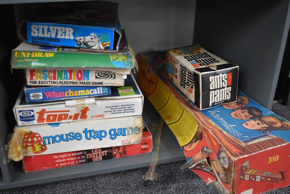 Nine 1960's and later toys and games including Marx Silver Lone Ranger Horse, Mousetrap, Sport