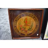 A framed London Midland & Scottish Railway Company wooden painted plaque having thistle decoration
