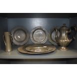 A fine selection of pewter wares including large R Baldwin charger and tudric styled vase