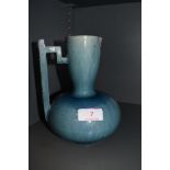 A early art deco design vase possibly attributed in style to Keith Murray with a blue glaze (AF) and