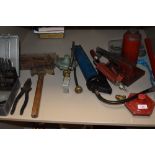 A selection of DIY and building tools including gas torches