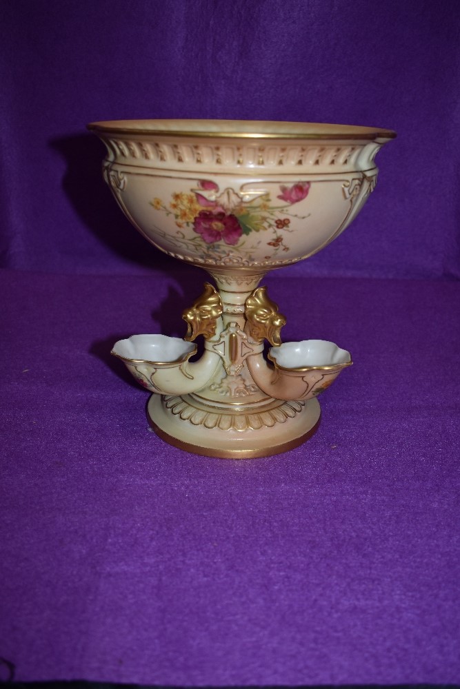 A Royal Worcester table centre or epergne in blush ivory with hand detailing, date marks worn