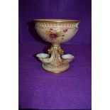A Royal Worcester table centre or epergne in blush ivory with hand detailing, date marks worn