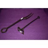 A vintage wrought iron branding iron for letter B and similar large fork