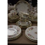 A part tea service by park place china including a set of six Mintons Marlow plates